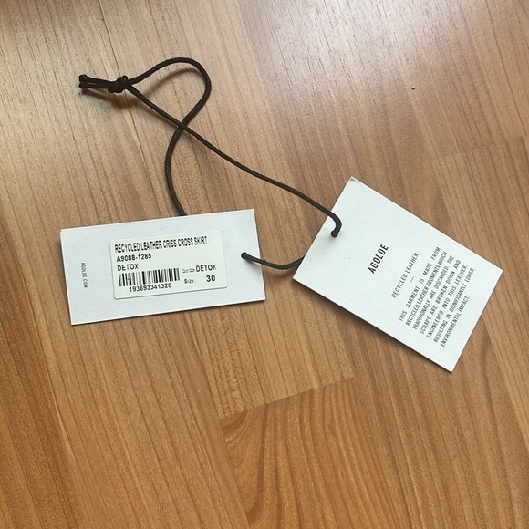 AGOLDE Recycled Leather Criss Cross Skirt. Black. Size 30. - Picture 12 of 12